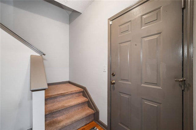 407 The Crossings Ln, Woodstock, GA 30189 - stairway featuring baseboards