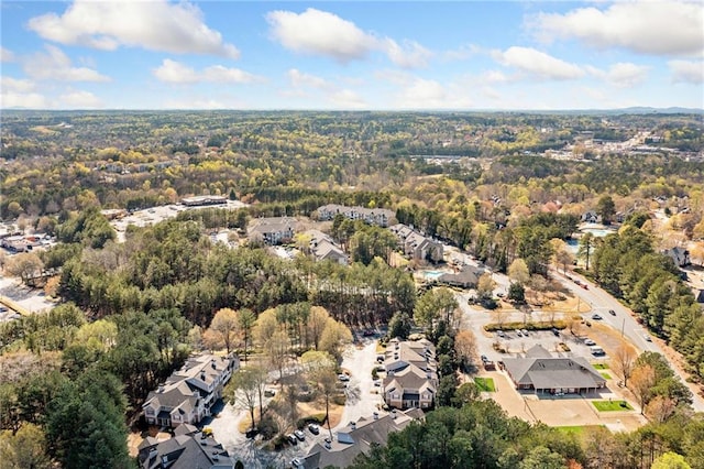 407 The Crossings Ln, Woodstock, GA 30189 - drone / aerial view with a residential view and a wooded view