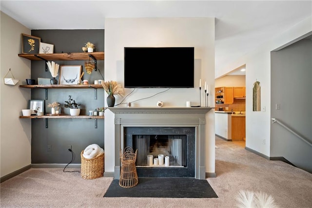 407 The Crossings Ln, Woodstock, GA 30189 - carpeted living room featuring a fireplace with flush hearth and baseboards