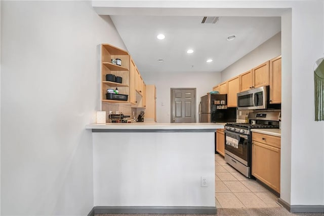 407 The Crossings Ln, Woodstock, GA 30189 - kitchen with open shelves, light brown cabinetry, visible vents, a peninsula, and appliances with stainless steel finishes
