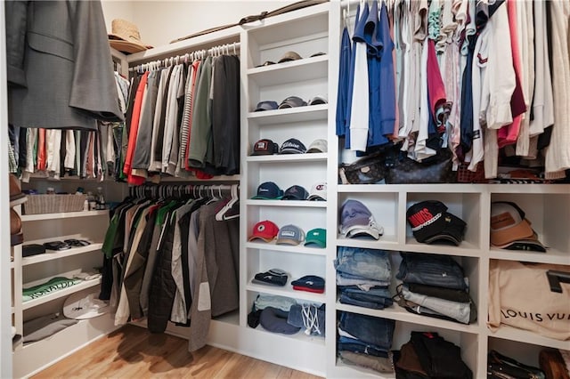 spacious closet featuring wood finished floors