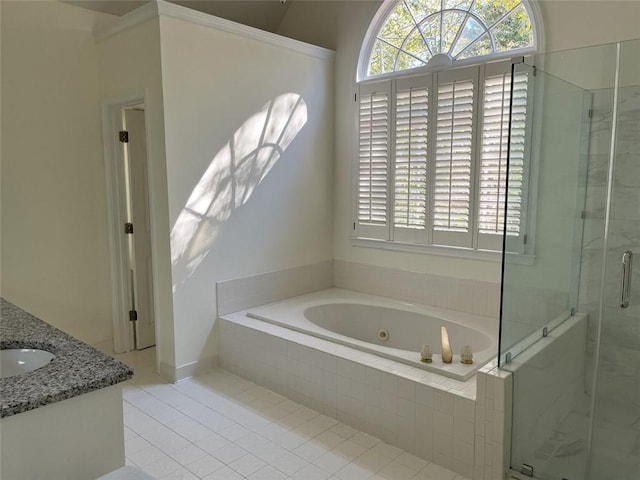 bathroom featuring vanity, tile patterned floors, and separate shower and tub