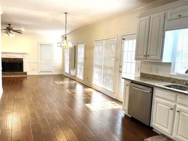 kitchen with dishwasher, white cabinets, and dark hardwood / wood-style flooring