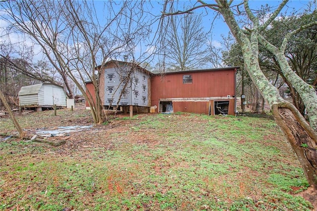 exterior space featuring an outbuilding and a storage unit