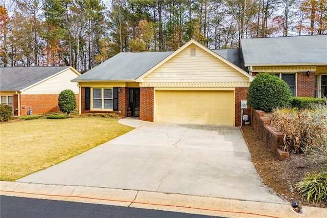 ranch-style home featuring a front yard and a garage