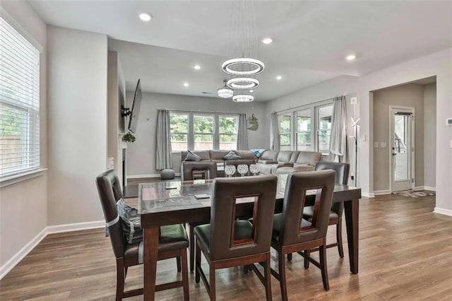 8 Unbridled Way, Newnan, GA 30263 - dining area with recessed lighting, a chandelier, baseboards, and wood finished floors