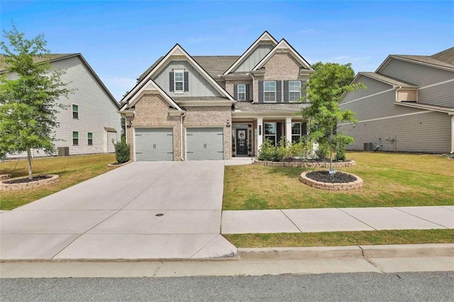 8 Unbridled Way, Newnan, GA 30263 - craftsman house with brick siding, board and batten siding, concrete driveway, an attached garage, and a front yard