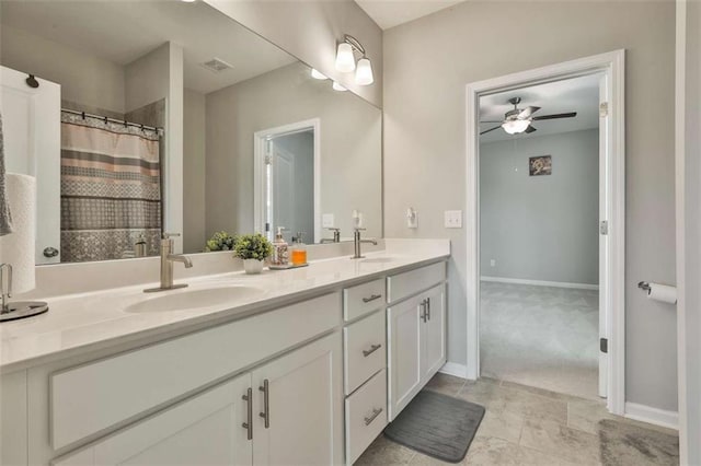 8 Unbridled Way, Newnan, GA 30263 - bathroom with double vanity, a ceiling fan, baseboards, and tile patterned flooring