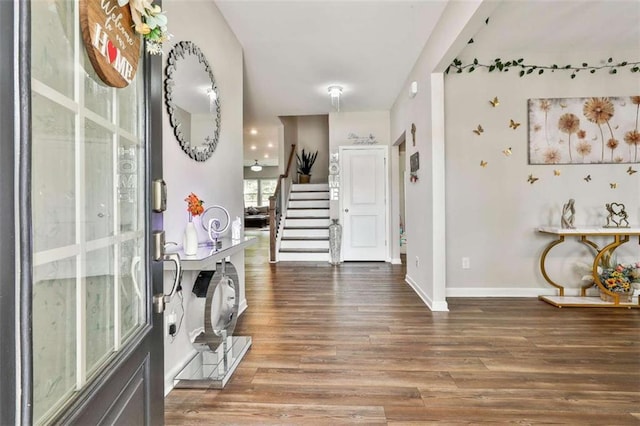 8 Unbridled Way, Newnan, GA 30263 - foyer entrance with wood finished floors, stairway, and baseboards