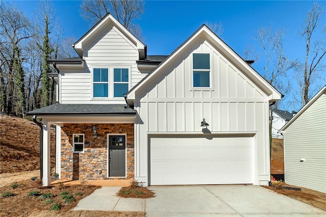 view of front of property with a garage