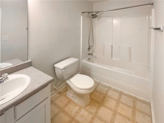 full bathroom featuring toilet, vanity, and shower / bathtub combination