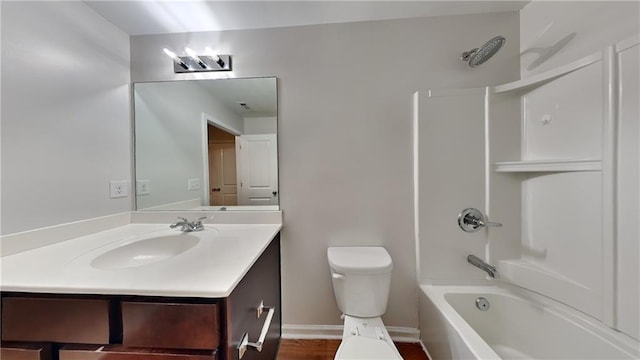 full bathroom with vanity, toilet, and bathtub / shower combination