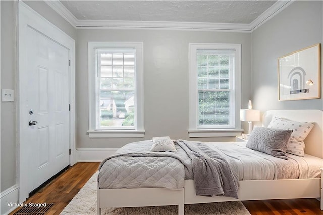 1615 Stokes Ave SW, Atlanta, GA 30310 - bedroom with ornamental molding and dark wood-style flooring