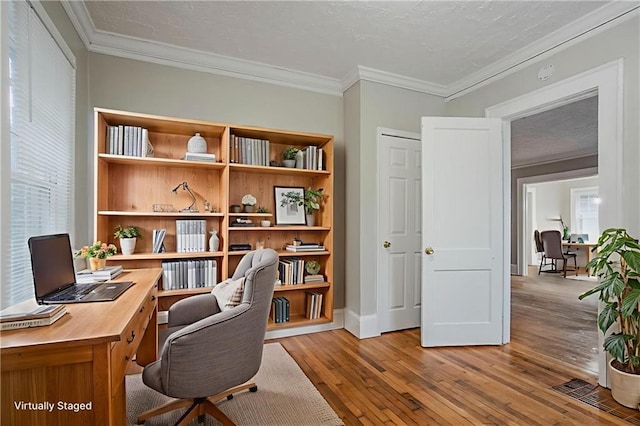1615 Stokes Ave SW, Atlanta, GA 30310 - office featuring wood-type flooring, crown molding, baseboards, and healthy amount of natural light