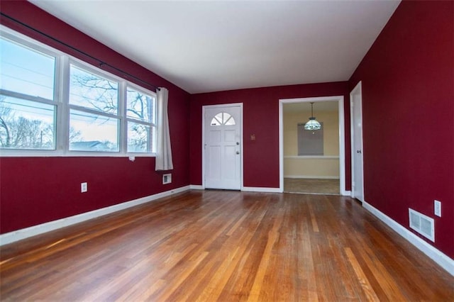 foyer with hardwood / wood-style floors