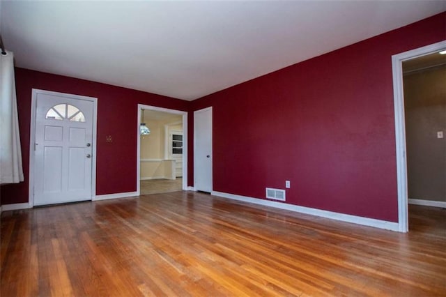 foyer with hardwood / wood-style floors