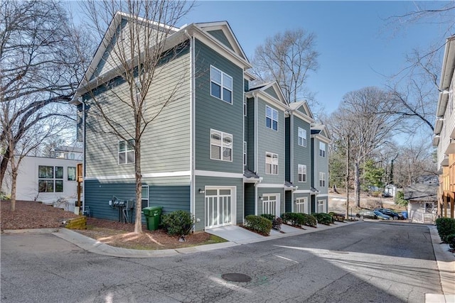 view of home's exterior with a residential view