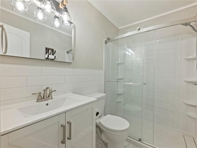 2938 Chestatee Rd, Gainesville, GA 30506 - full bathroom with crown molding, tile walls, a stall shower, vanity, and toilet