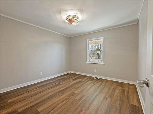 2938 Chestatee Rd, Gainesville, GA 30506 - spare room featuring crown molding, dark wood-style flooring, baseboards, and visible vents