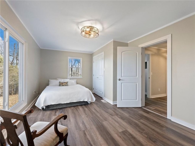 2938 Chestatee Rd, Gainesville, GA 30506 - bedroom with baseboards, dark wood-style floors, and ornamental molding
