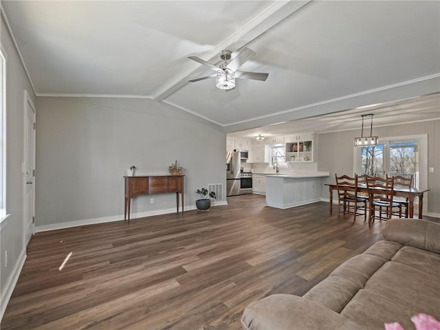 2938 Chestatee Rd, Gainesville, GA 30506 - living room with ceiling fan, lofted ceiling with beams, ornamental molding, baseboards, and dark wood-style floors