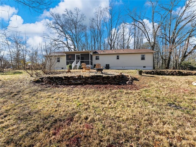 2938 Chestatee Rd, Gainesville, GA 30506 - back of house with a sunroom, a lawn, and crawl space