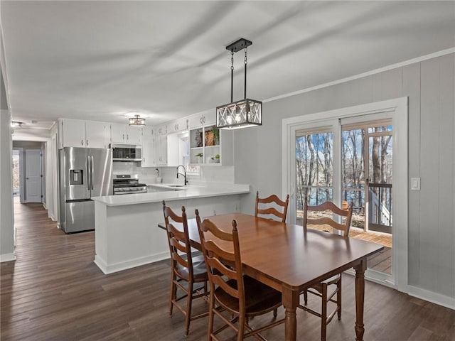 2938 Chestatee Rd, Gainesville, GA 30506 - dining area featuring a chandelier, baseboards, and dark wood finished floors