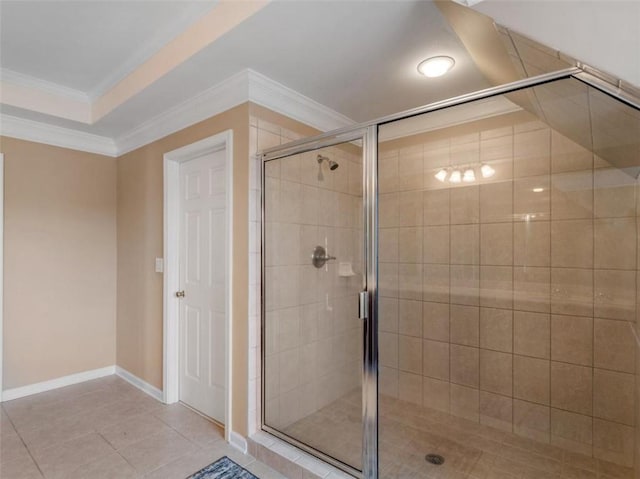 bathroom featuring ornamental molding, an enclosed shower, and tile patterned floors