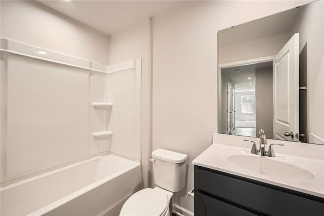 full bathroom featuring vanity, toilet, and shower / washtub combination