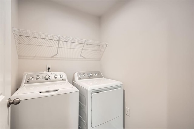 laundry room featuring laundry area and washer and dryer
