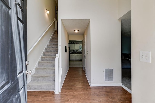 entrance foyer with hardwood / wood-style flooring