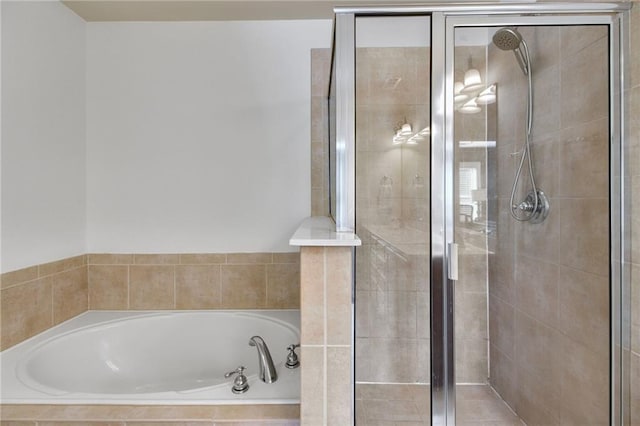 bathroom with independent shower and bath