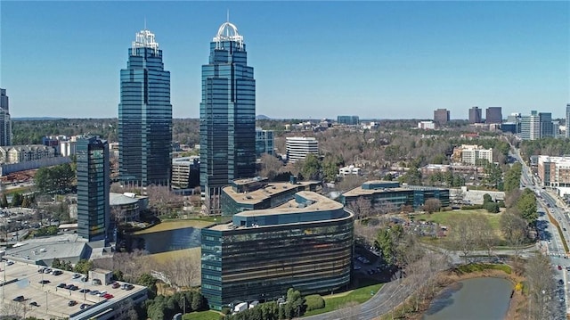 property's view of city featuring a water view