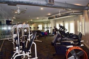 gym with ceiling fan