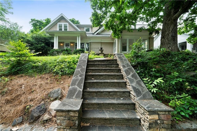 1276 Lanier Blvd NE, Atlanta, GA 30306 - view of front of home featuring stairs and a porch