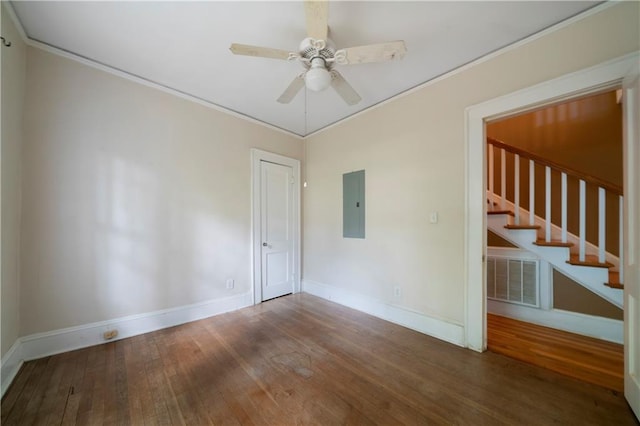 1276 Lanier Blvd NE, Atlanta, GA 30306 - empty room featuring hardwood / wood-style floors, crown molding, stairway, baseboards, and a ceiling fan