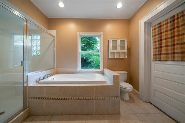 1276 Lanier Blvd NE, Atlanta, GA 30306 - bathroom featuring toilet, a garden tub, a stall shower, tile patterned flooring, and ornamental molding