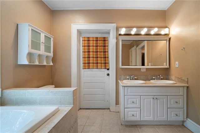 1276 Lanier Blvd NE, Atlanta, GA 30306 - full bath featuring a bath, double vanity, tile patterned floors, baseboards, and crown molding