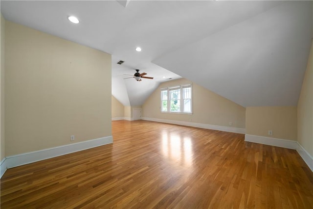 1276 Lanier Blvd NE, Atlanta, GA 30306 - additional living space featuring light wood-type flooring, baseboards, lofted ceiling, ceiling fan, and recessed lighting