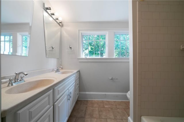 1276 Lanier Blvd NE, Atlanta, GA 30306 - full bathroom featuring a shower, double vanity, toilet, a bath, and baseboards