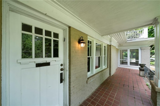 1276 Lanier Blvd NE, Atlanta, GA 30306 - doorway to property with brick siding and covered porch