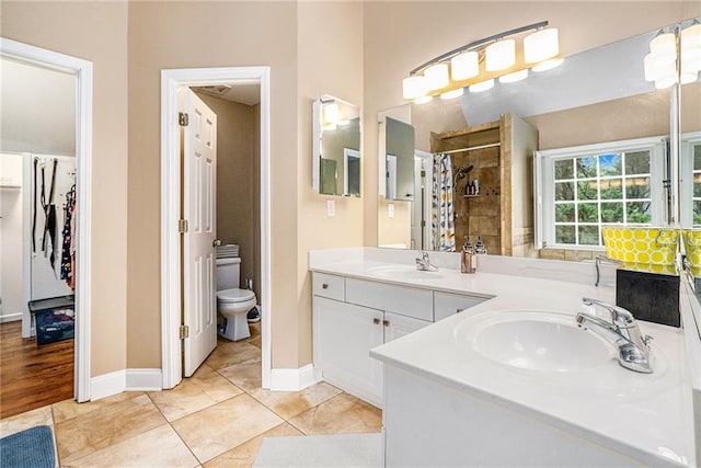 3117 Blowing Wind Ct NW, Acworth, GA 30101 - bathroom featuring double vanity and tiled shower