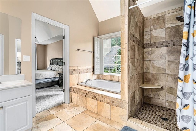3117 Blowing Wind Ct NW, Acworth, GA 30101 - bathroom featuring ensuite bath, a tile shower, a garden tub, vaulted ceiling, and vanity