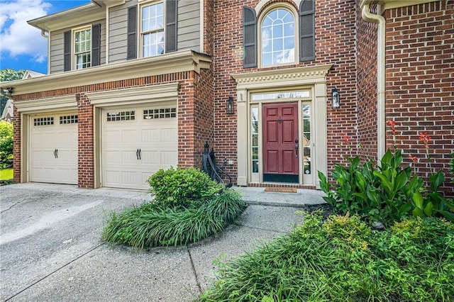 3117 Blowing Wind Ct NW, Acworth, GA 30101 - doorway to property featuring concrete driveway, a garage, and brick siding