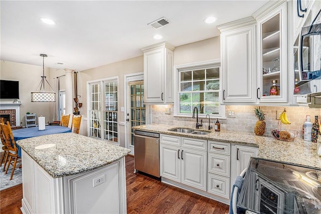 3117 Blowing Wind Ct NW, Acworth, GA 30101 - kitchen featuring dishwasher, black / electric stove, dark wood-style floors, tasteful backsplash, and white cabinetry