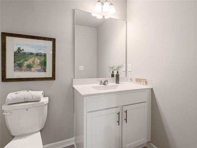 5641 Hislop Ln Unit 88, Mableton, GA 30126 - bathroom with baseboards, toilet, and vanity