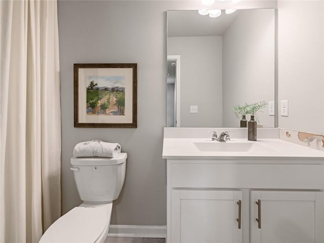 5641 Hislop Ln Unit 88, Mableton, GA 30126 - bathroom with baseboards, toilet, and vanity