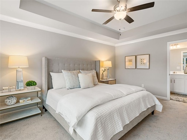 5641 Hislop Ln Unit 88, Mableton, GA 30126 - bedroom featuring a ceiling fan, ensuite bathroom, a tray ceiling, light colored carpet, and baseboards