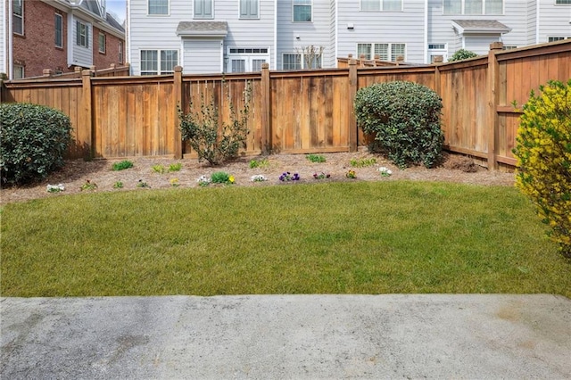 view of yard featuring a fenced backyard