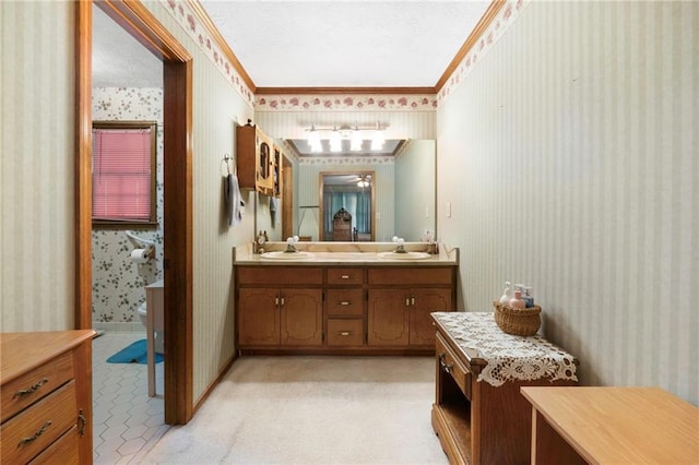 bathroom featuring vanity and ornamental molding